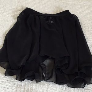 Girls size L child dance skirt. Never worn.